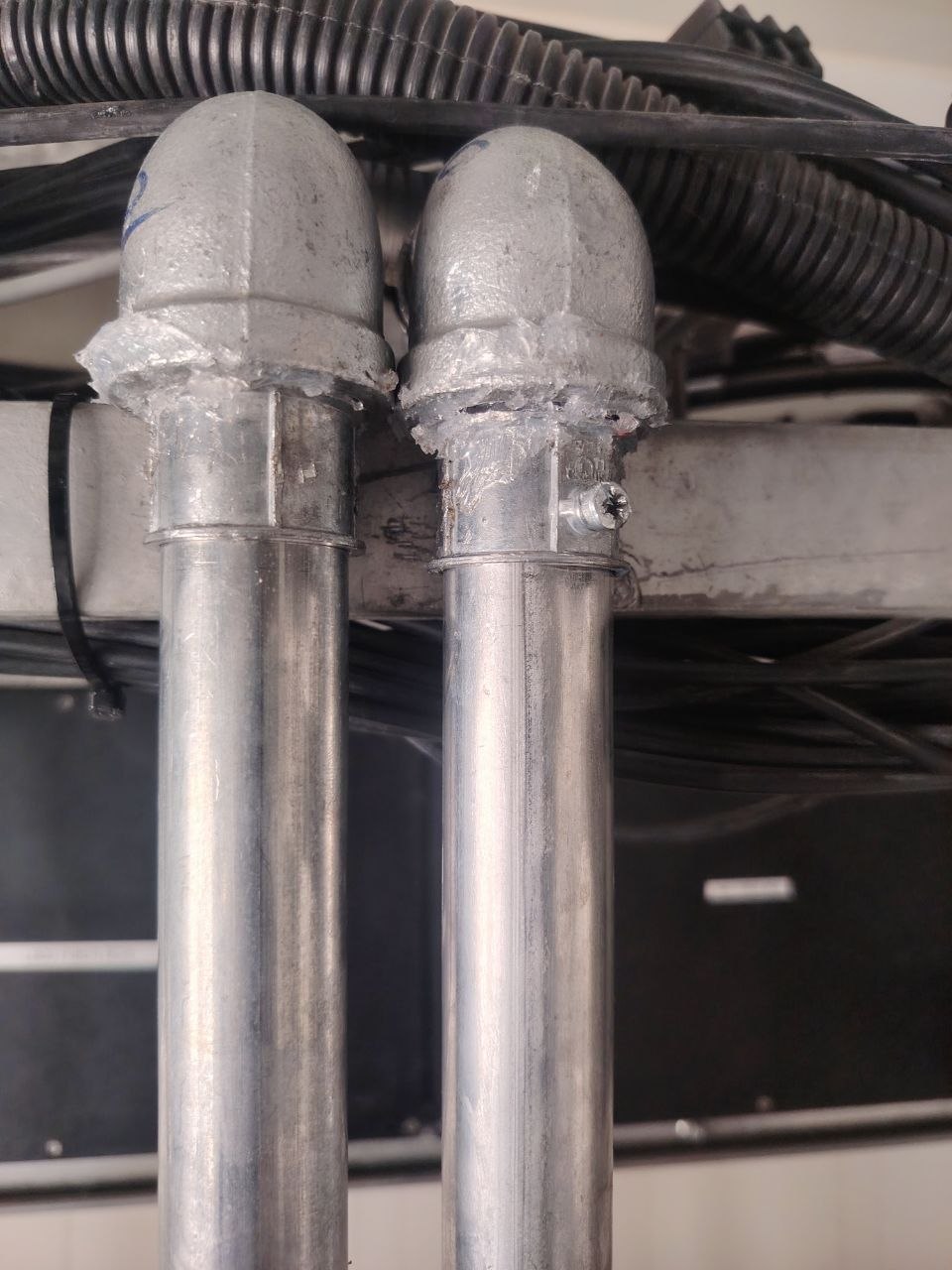 Close-up image of the power cable protection installation